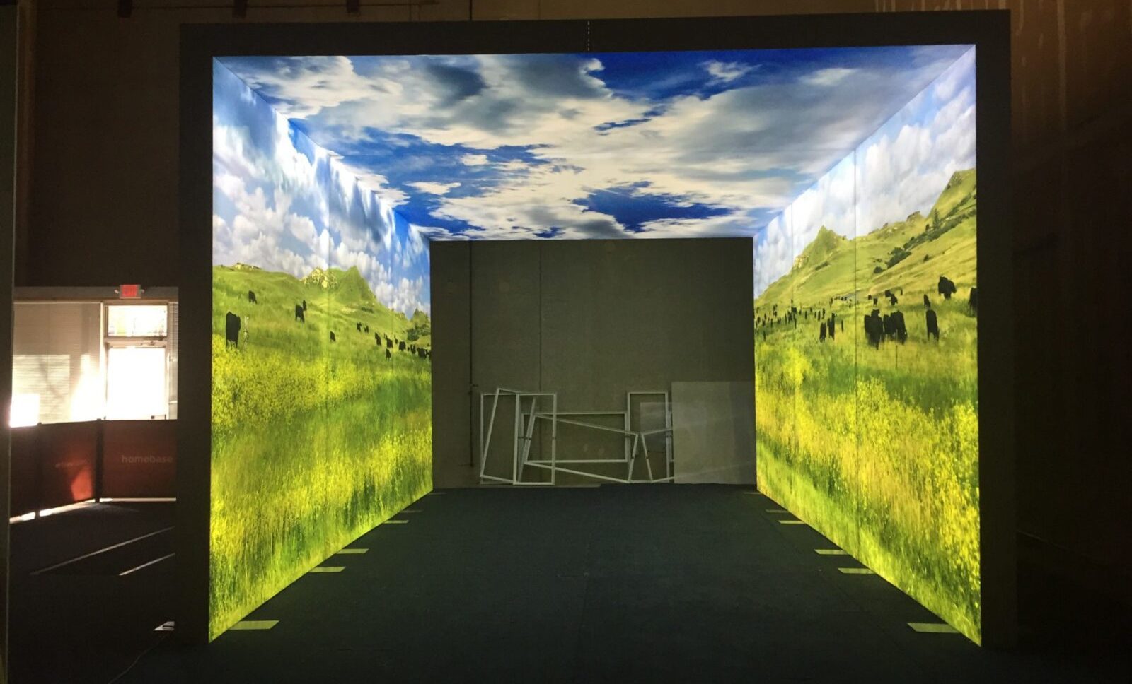 US Foods Trade Show SEG lightbox freestanding archway with seating and double-sided graphics and turf