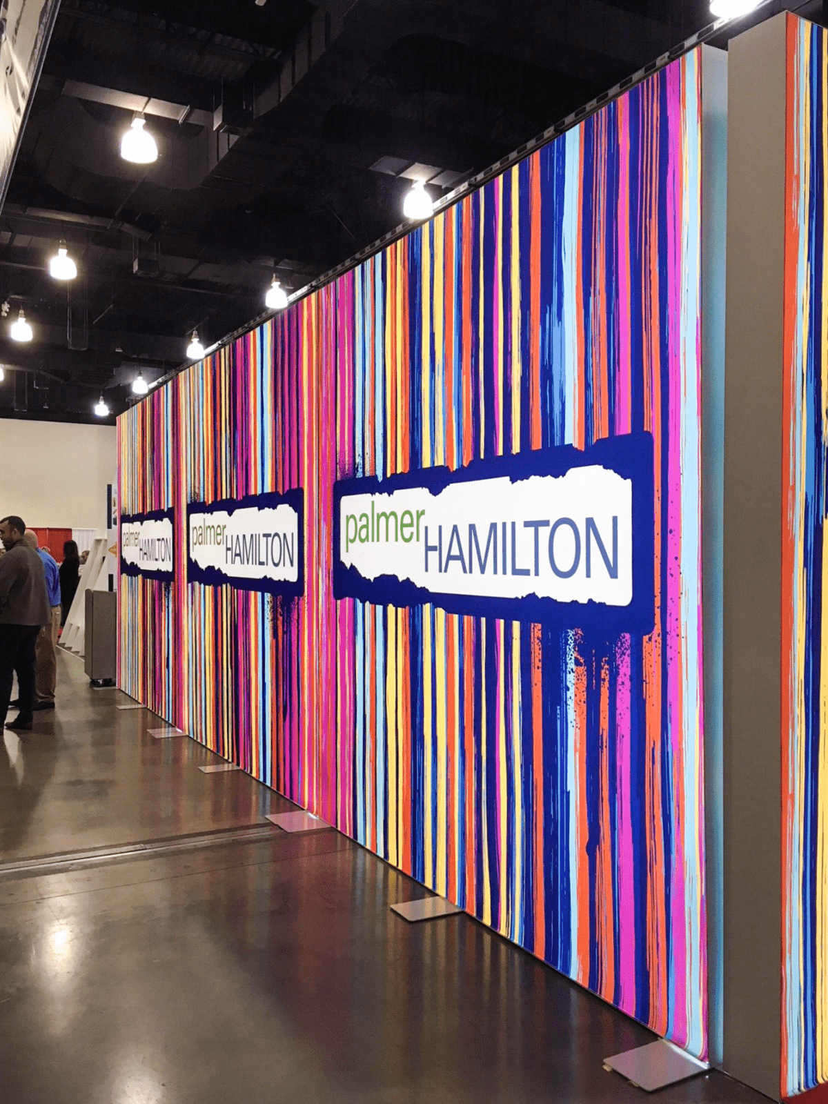Palmer Hamilton Trade Show Booth (2) Palmer Hamilton Trade Show Booth that uses freestanding and arched lightboxes to create an environment